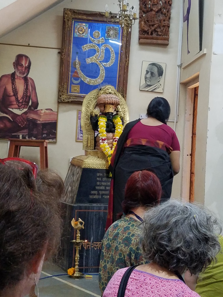 Abhijata doing puja before the Intro session at Yoga Intensive 2016