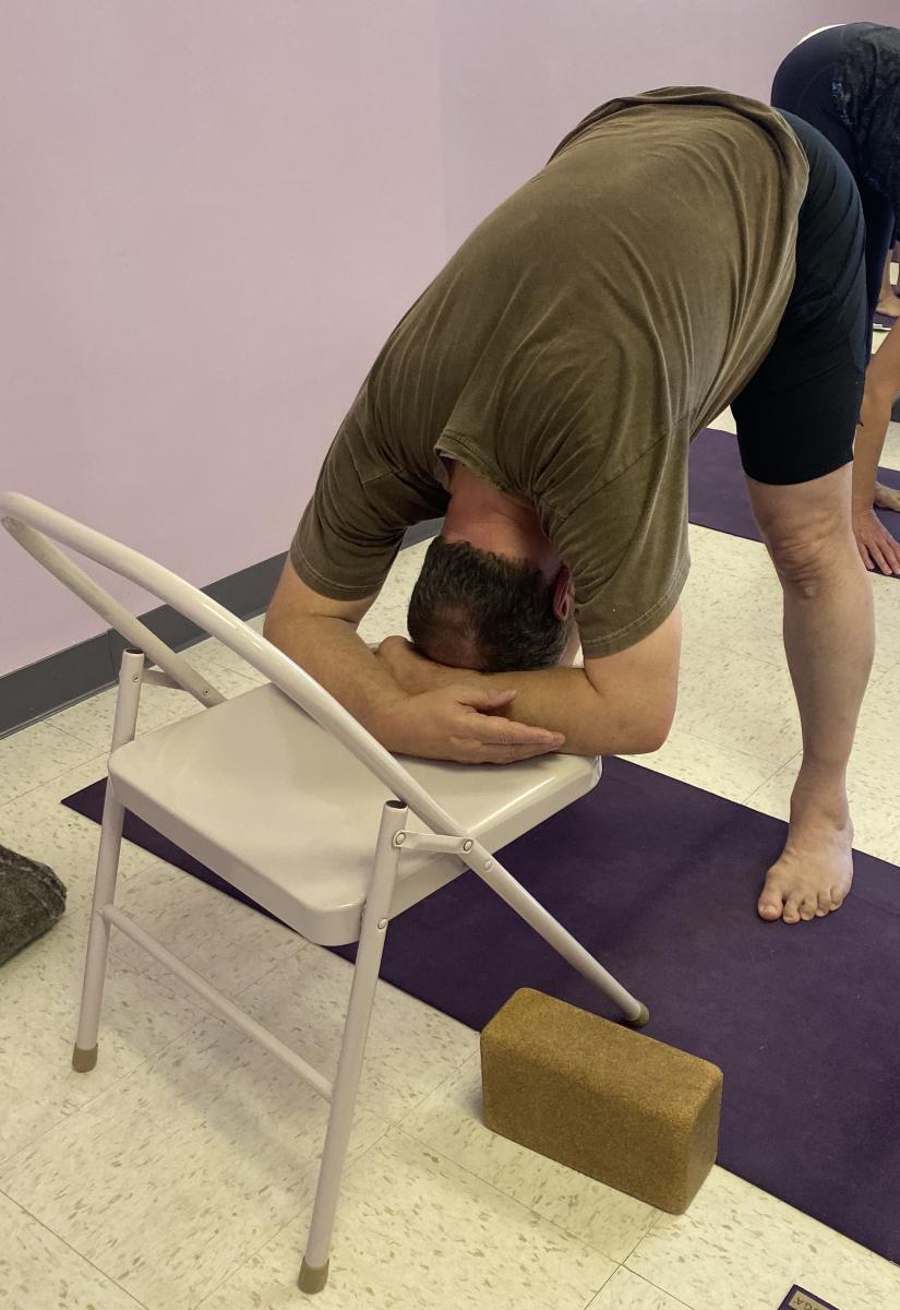 (y) uttanasana-headonchair